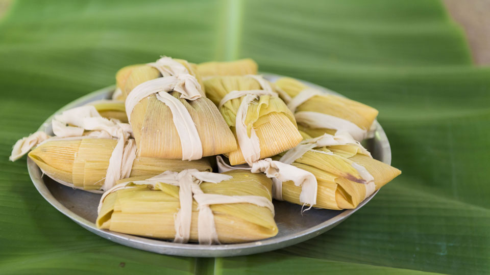 Traditionelle hausgemachte Tamale sind ein beliebtes lateinamerikanisches Gericht, nicht nur in Mexiko - (Foto: ©Toronto-Images.Com / Shutterstock)